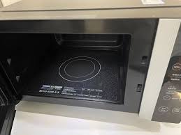 微波炉旋转托盘的功能与主要用途解析